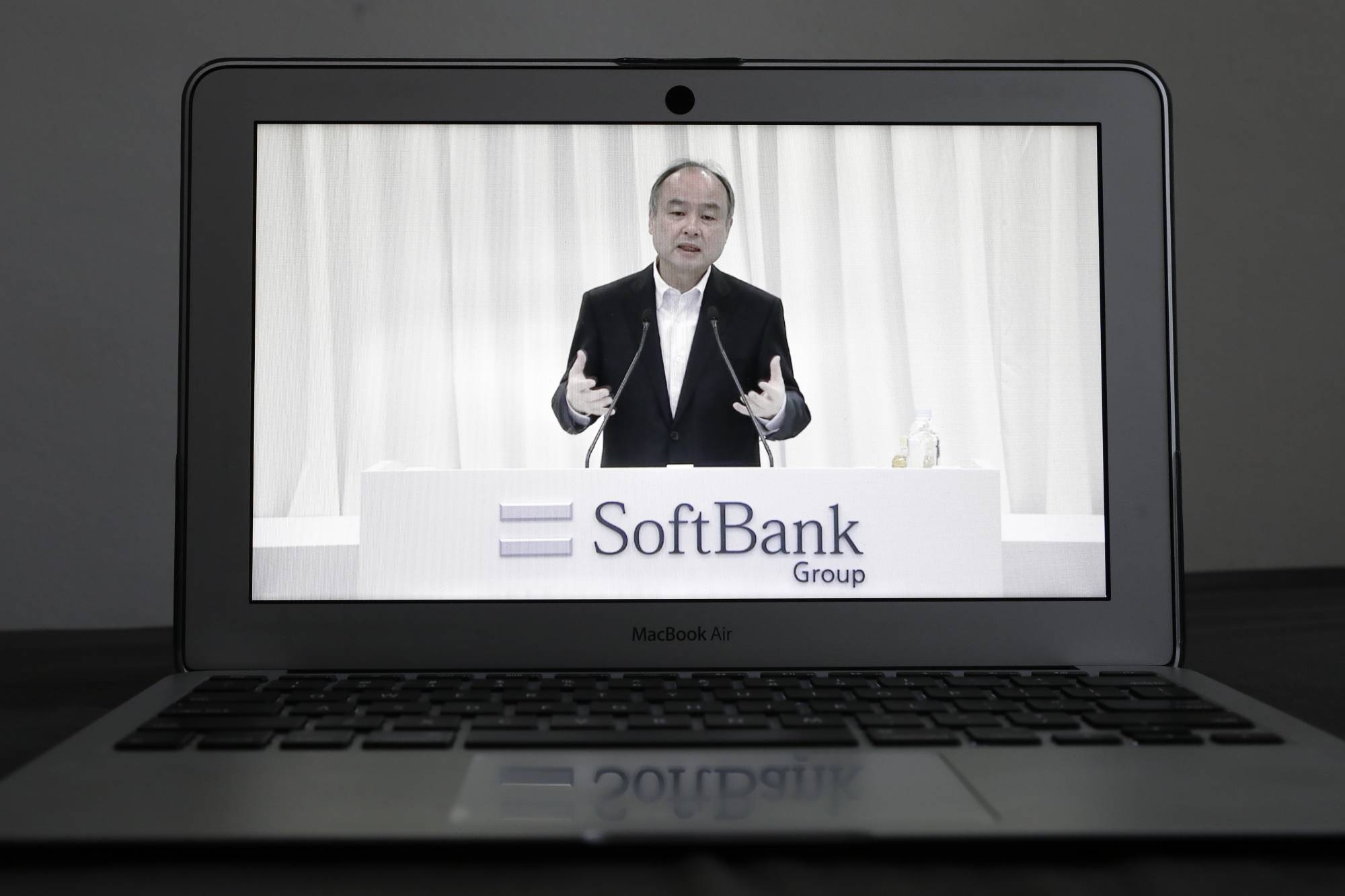 Masayoshi Son, chairman and chief executive officer of SoftBank Group Corp., ended his company’s annual shareholder meeting with a surprise Thursday by announcing he’s stepping down from the board of Chinese e-commerce titan Alibaba Group Holding Ltd. | BLOOMBERG