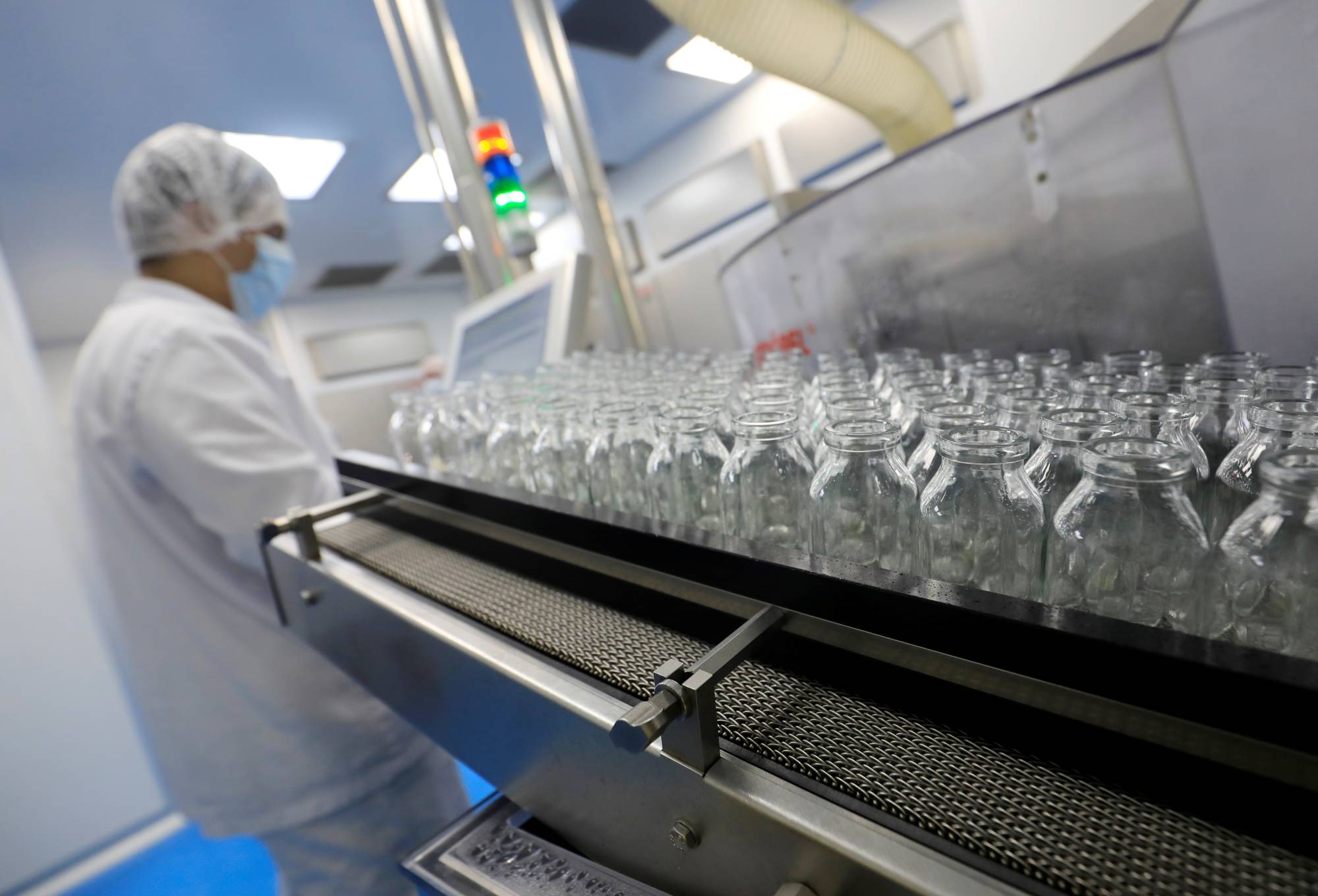 A lab technician works on remdesivir at an Eva Pharma facility in Cairo. | Reuters 