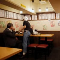 Small eating establishments in Japan have struggled with the absence of customers since the government expanded its state of emergency in April. | REUTERS