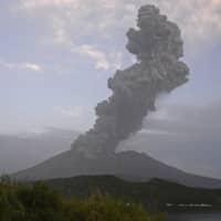 A photo taken on May 9 from an unmanned camera in Tarumizu, Kagoshima Prefecture, shows an eruption from Mount Sakurajima in the prefecture. | KYODO
