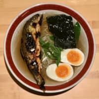 Hooked on ramen: Ayu Ramen Plus’ featured dish comes topped with either a half or whole grilled ayu sweetfish. | ROBBIE SWINNERTON
