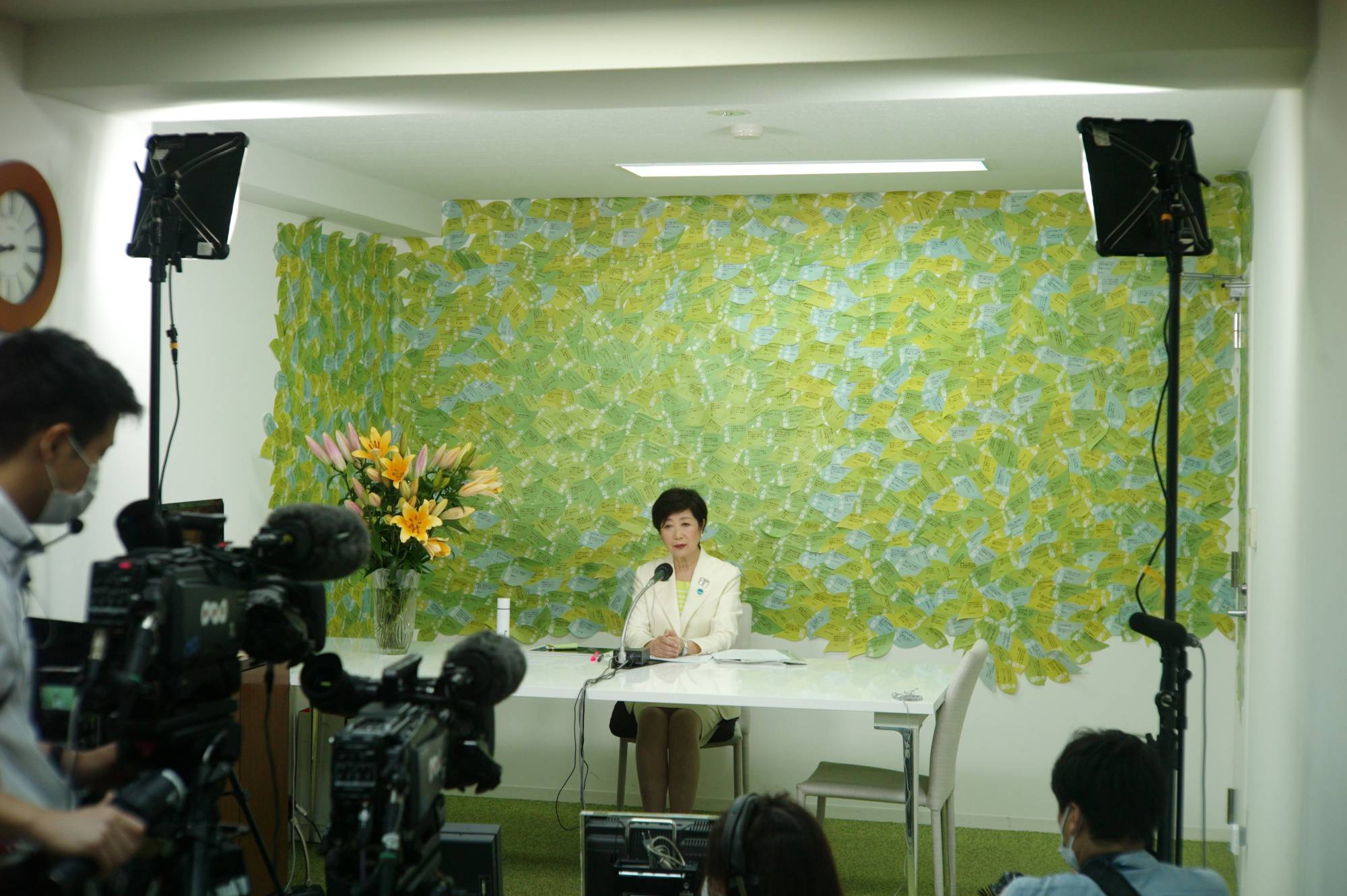 Tokyo Gov. Yuriko Koike speaks to the media after projections pointed to her re-election on Sunday.  | RYUSEI TAKAHASHI