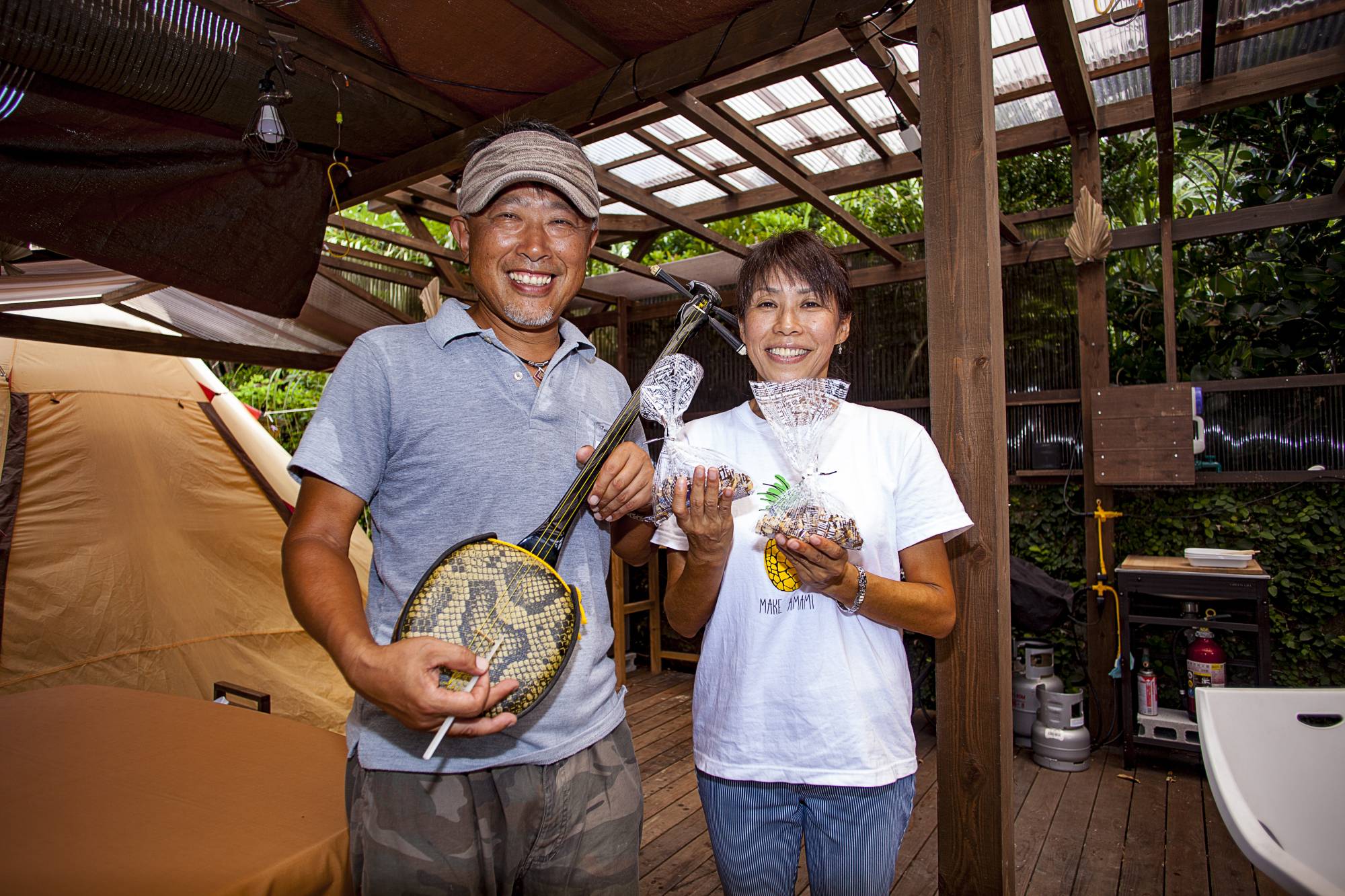 Rika and Teri Hisai left Kanagawa Prefecture to establish a new life on Amami Oshima in Kagoshima Prefecture. | CALDERWOOD IMAGES / DERMOT KILLORAN