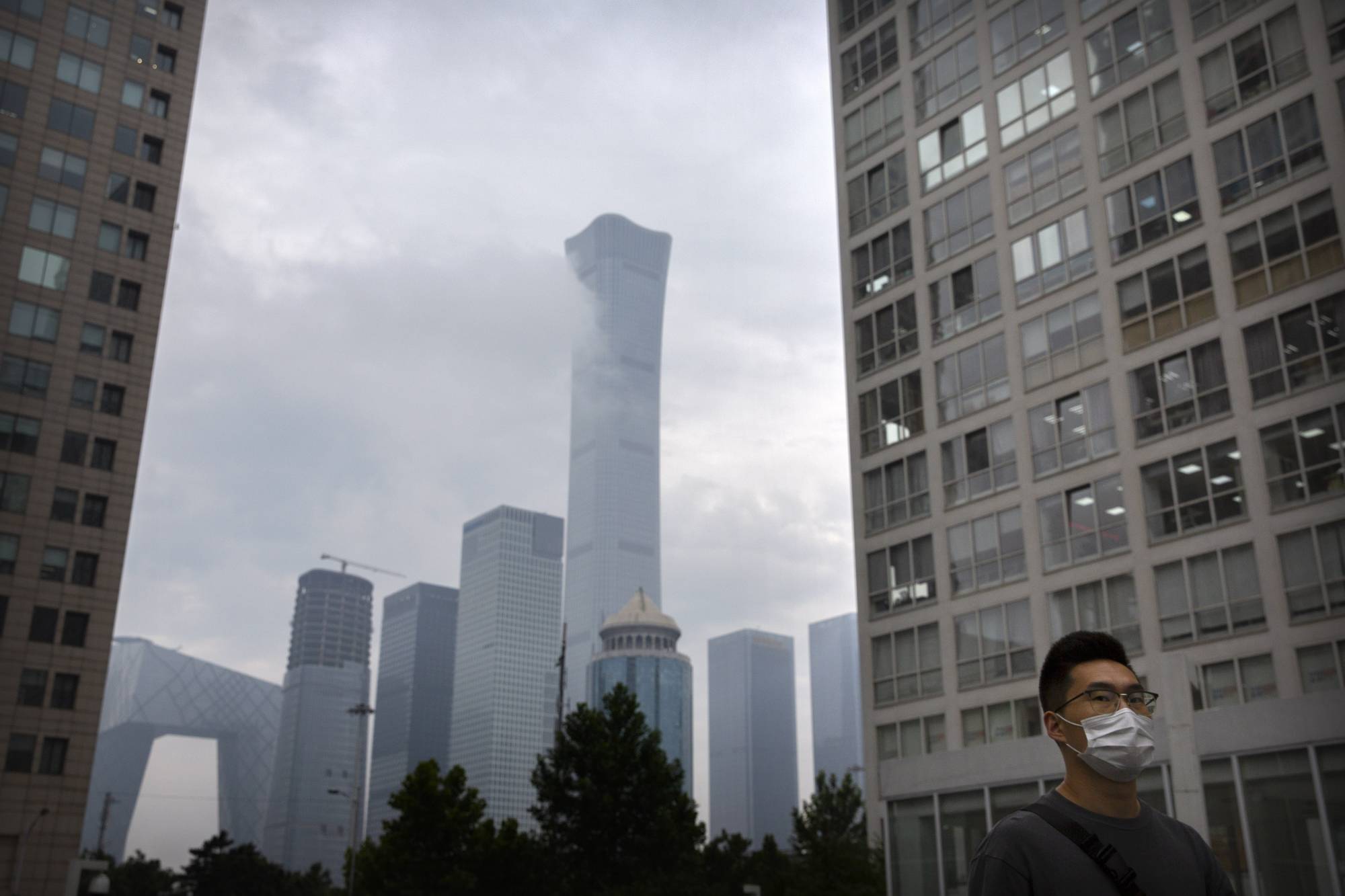 The central business district in Beijing. According to an estimate, Shanghai saw 27,000 deaths from Jan. 1 due to smog, more than the 22,000 in Beijing. | AP