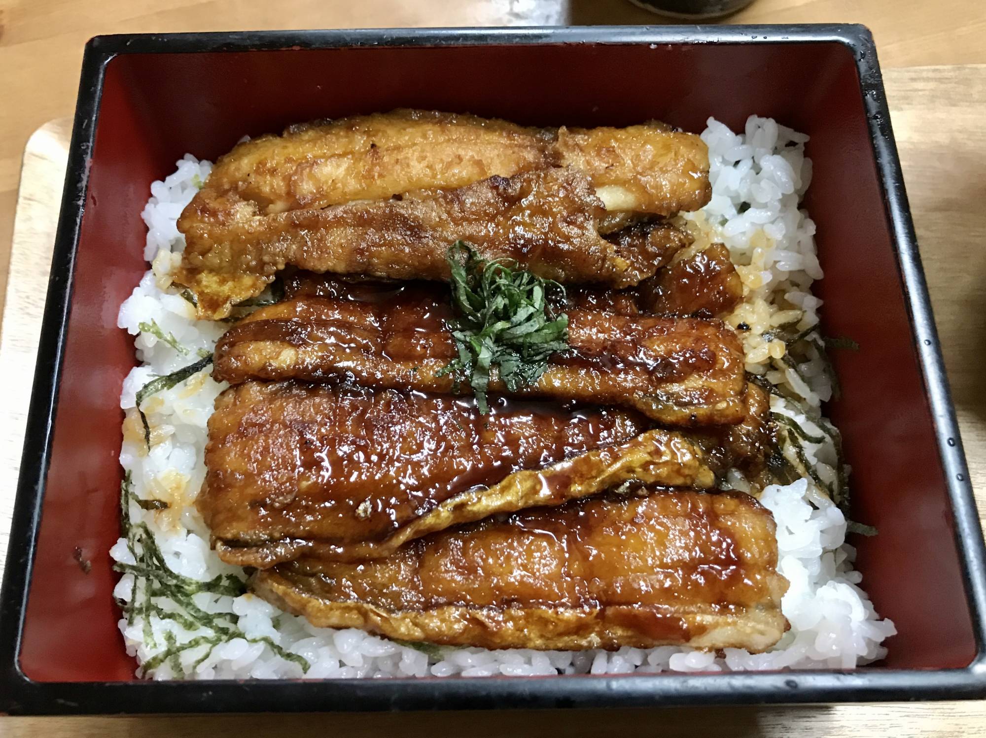 Better than unagi: Usami’s take on the classic unajū (grilled freshwater eel rice bowl) swaps out expensive eel for deliciously meaty silver beltfish, locally fished in Usuki. | FLORENTYNA LEOW