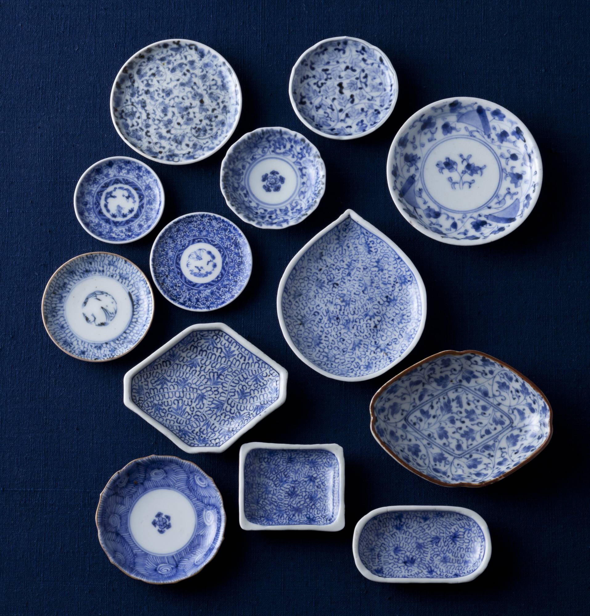 Blue and white: Mamezara with karakusa (arabesque of intertwining vines and leaves) designs.