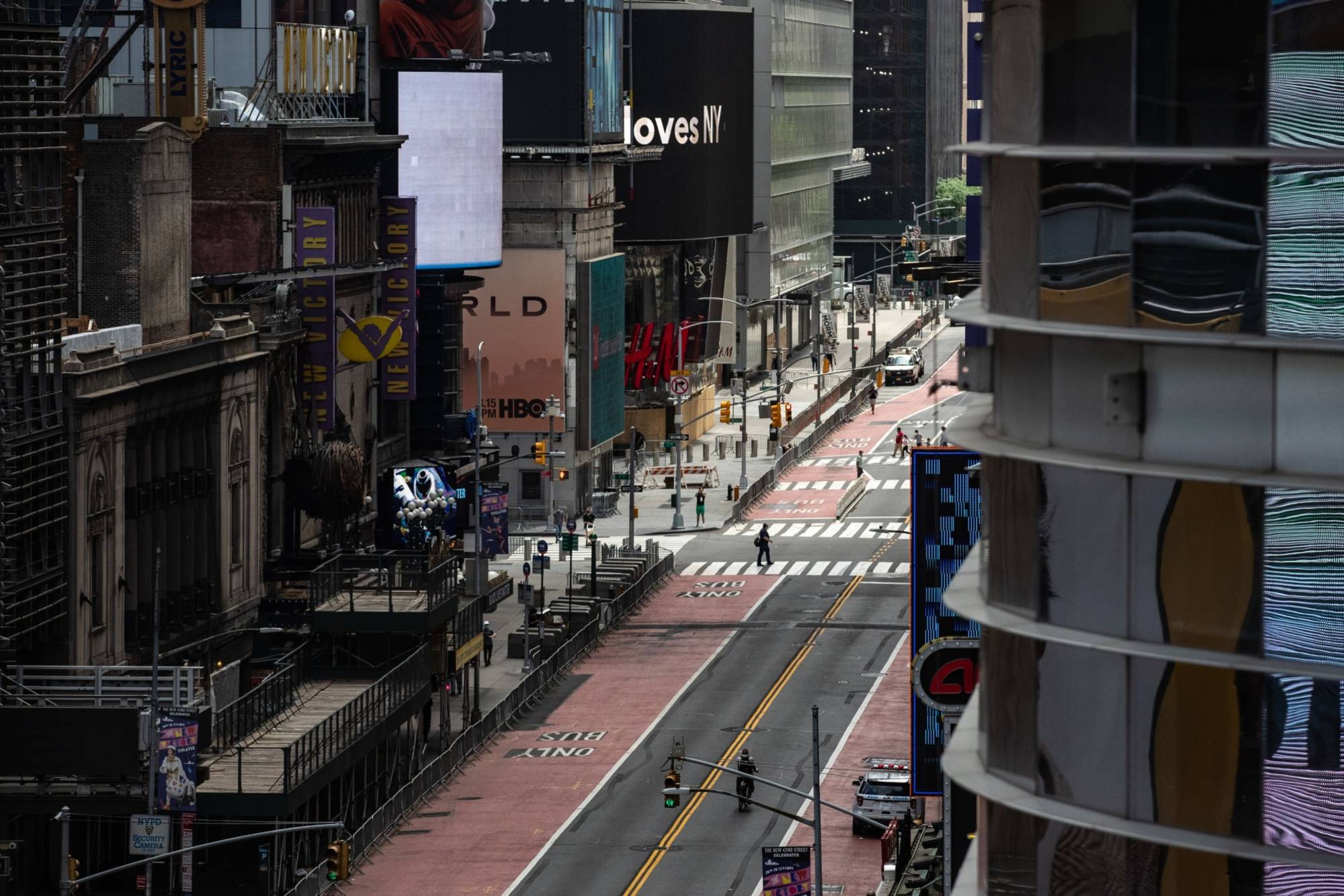 A nearly empty street is seen in Times Square on June 11, days after New York City's lockdown eased. New research shows that economic losses have come mainly from fear, not government mandates.  | BLOOMBERG