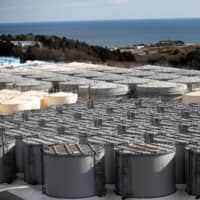 Tokyo Electric Power Co. Holdings Inc. projects that tanks at the Fukushima No. 1 plant that hold contaminated water will reach capacity in the summer of 2022. | REUTERS