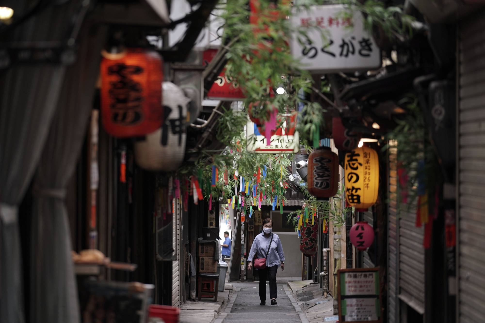A government tourism campaign will exclude those who are traveling to and from Tokyo. | AP