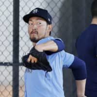 Mariners pitcher Yoshihisa Hirano has returned to training after successfully recovering from the coronavirus. | KYODO