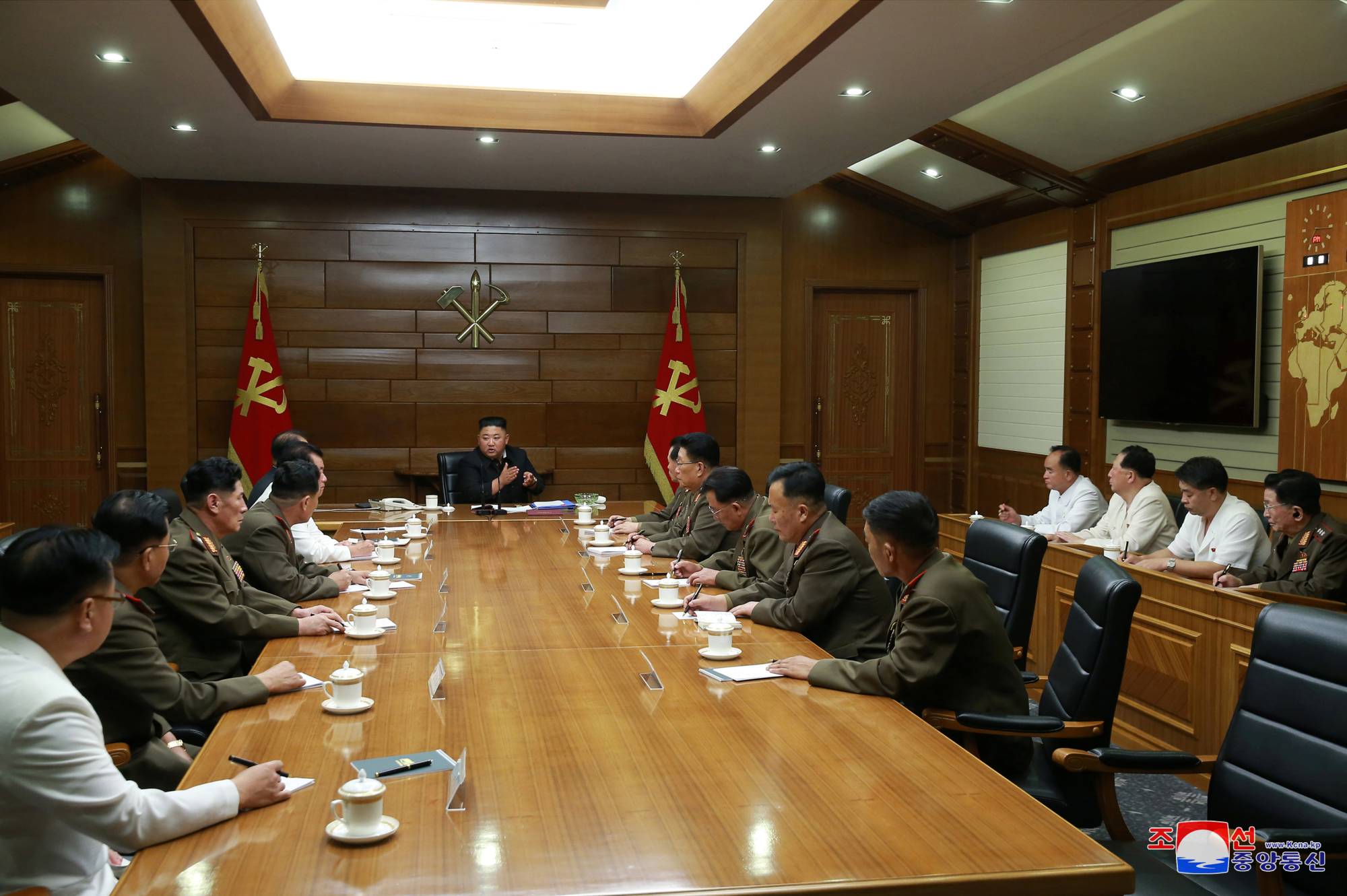 North Korean leader Kim Jong Un guides a Central Military Commission meeting in this photo released Sunday. | KCNA / VIA REUTERS
