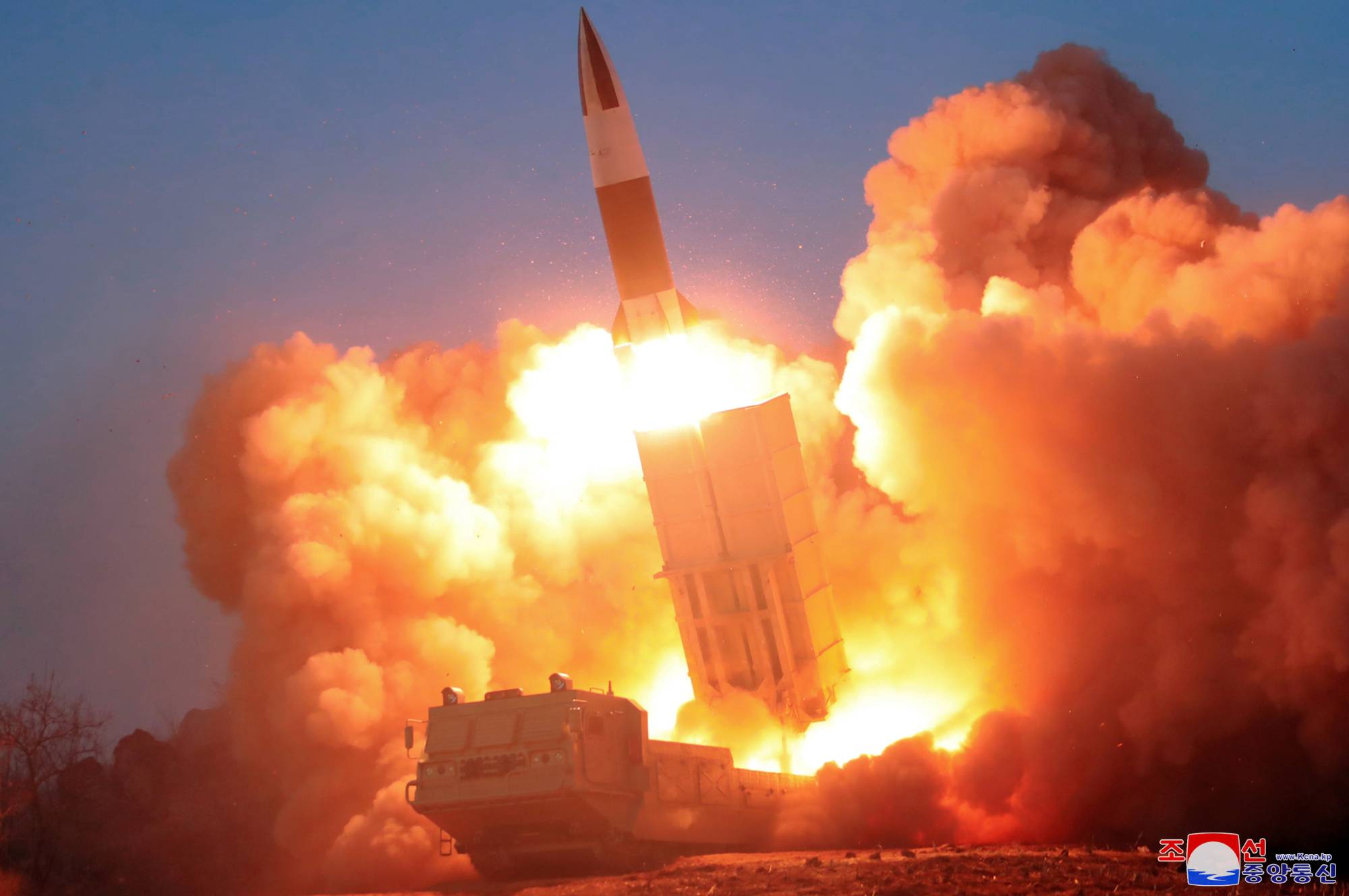 An apparent North Korean ballistic missile is fired in this image released on March 22. | KCNA / VIA REUTERS