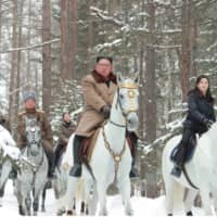 North Korean leader Kim Jong Un rides a horse as he visits battle sites in the area of Mount Paektu in Ryanggang, North Korea, in this picture released in December. | KCNA / VIA REUTERS
