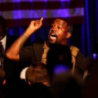 Rapper Kanye West holds his first rally in support of his presidential bid in North Charleston, South Carolina, on Sunday. | REUTERS
