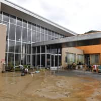 When the Kuma River overflowed on July 4, it flooded Senjuen nursing care facility, leaving 14 residents dead. | NISHINIPPON SHIMBUN
