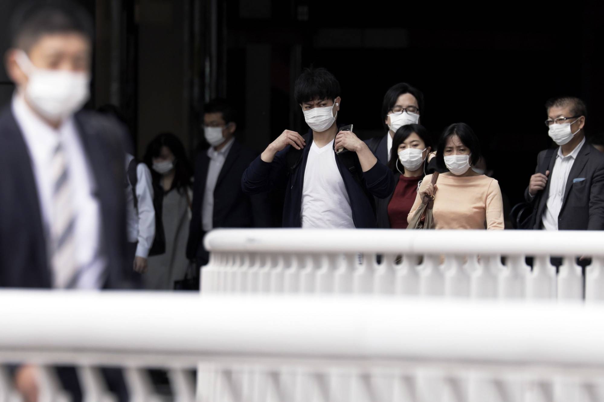 The Japanese government has spent considerable resources trying to increase gender equality in the workplace, but similar programs aimed at improving equality outside the office are appear necessary. | BLOOMBERG