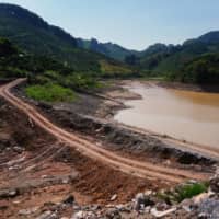 A dam collapsed at around midday on June 7, inundating roads, orchards and fields in Yangshuo county\'s Shazixi village, residents said. | REUTERS