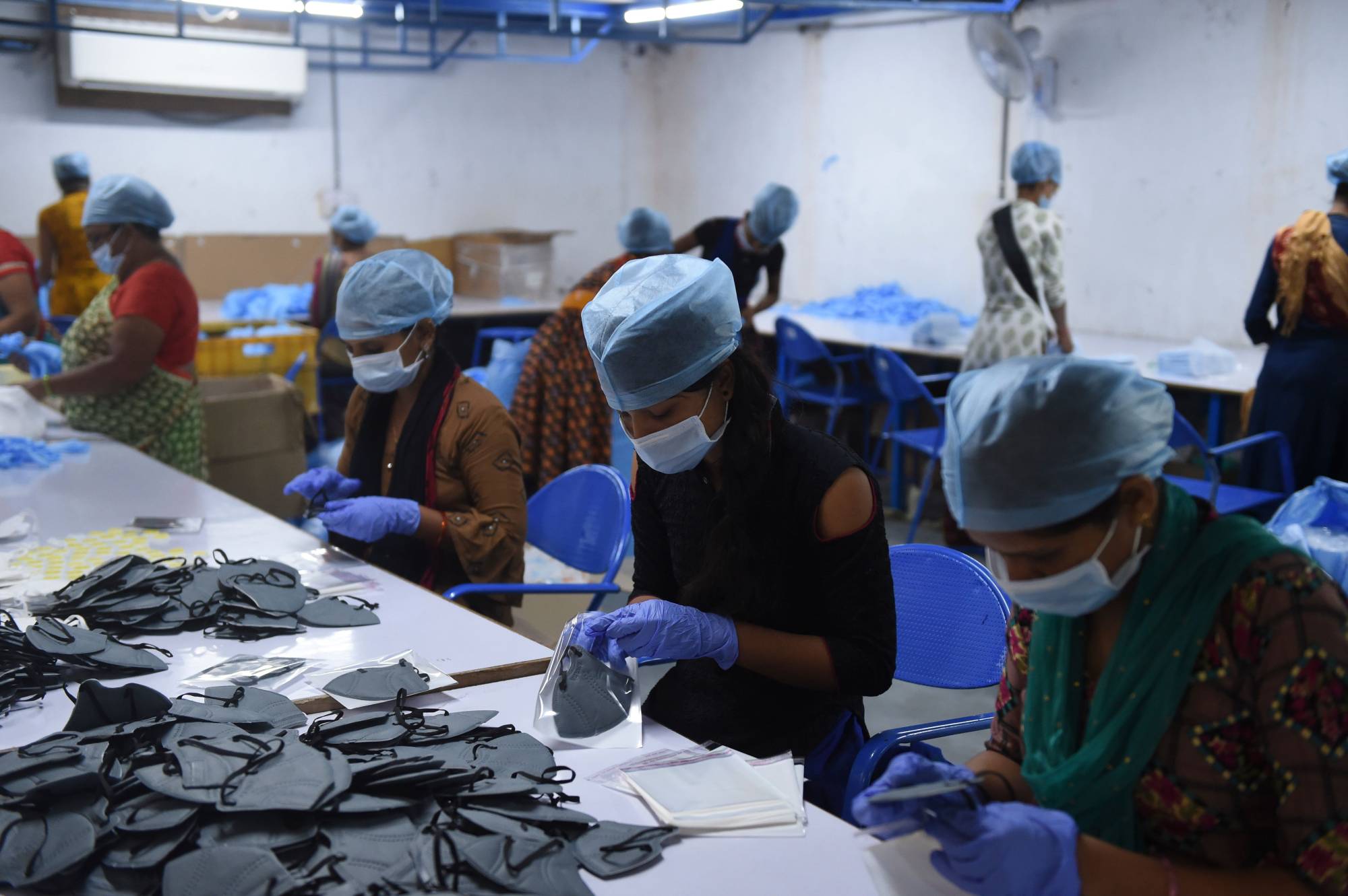 Labor advocates in India say the measures in place at factories do not go far enough, calling for more routine inspections, guaranteed living wages, as well as housing and transportation for workers during the pandemic. | AFP-JIJI