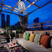 Luxury outdoor living: A balcony designed and executed by Theodore Jennings of Vacation Veranda. | ATSUSHI ISHIDA