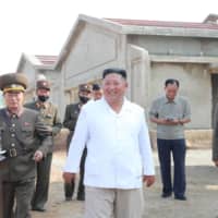 North Korean leader Kim Jong Un visits the under-construction Kwangchon Chicken Farm in this undated photo. More than 40 countries haveaccused the North Korea of illicitly breaching a United Nations cap on refined petroleum imports. | KCNA / VIA REUTERS