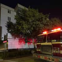 A firetruck responds to reports that documents were being burned in the courtyard of the Chinese Consulate in Houston on Wednesday after the U.S. government ordered China to close it. | AP