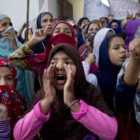 Kashmiri girls shout freedom slogans during a protest after Indian government scrapped the region\'s semi-autonomy and imposed an unprecedented security clampdown in Srinagar.  | AP