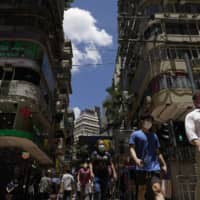 While still modest compared with outbreaks in many global cities, the uptick in Hong Kong is particularly troubling, arriving after months with near-zero community transmission and from as yet untraceable origins. | AP