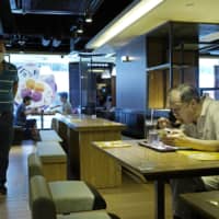 Measures to prevent the spread of COVID-19 have gotten incrementally tighter in Hong Kong in recent weeks. Dining-in was originally banned for dinner, but that rule was later expanded to also include lunch. | AP