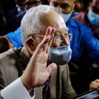 Former Malaysian Prime Minister Najib Razak departs from the Kuala Lumpur Courts Complex on Tuesday.  | BLOOMBERG 