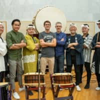 Drum up the drama: Bill Hemstapat (third from left), Chad Cannon (fifth from left), Peter Scaturro (sixth from left) with the taiko ensemble at Sound City studio in Tokyo.