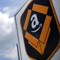 Amazon.com Inc.\'s second-quarter revenue jumped after the online retail giant made investments to keep operating through the pandemic. | BLOOMBERG