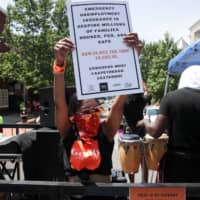 Protesters demand the extension of unemployment aid on Capitol Hill in Washington on July 22. The crippling financial impact of the coronavirus crisis could spur economic reforms. | REUTERS