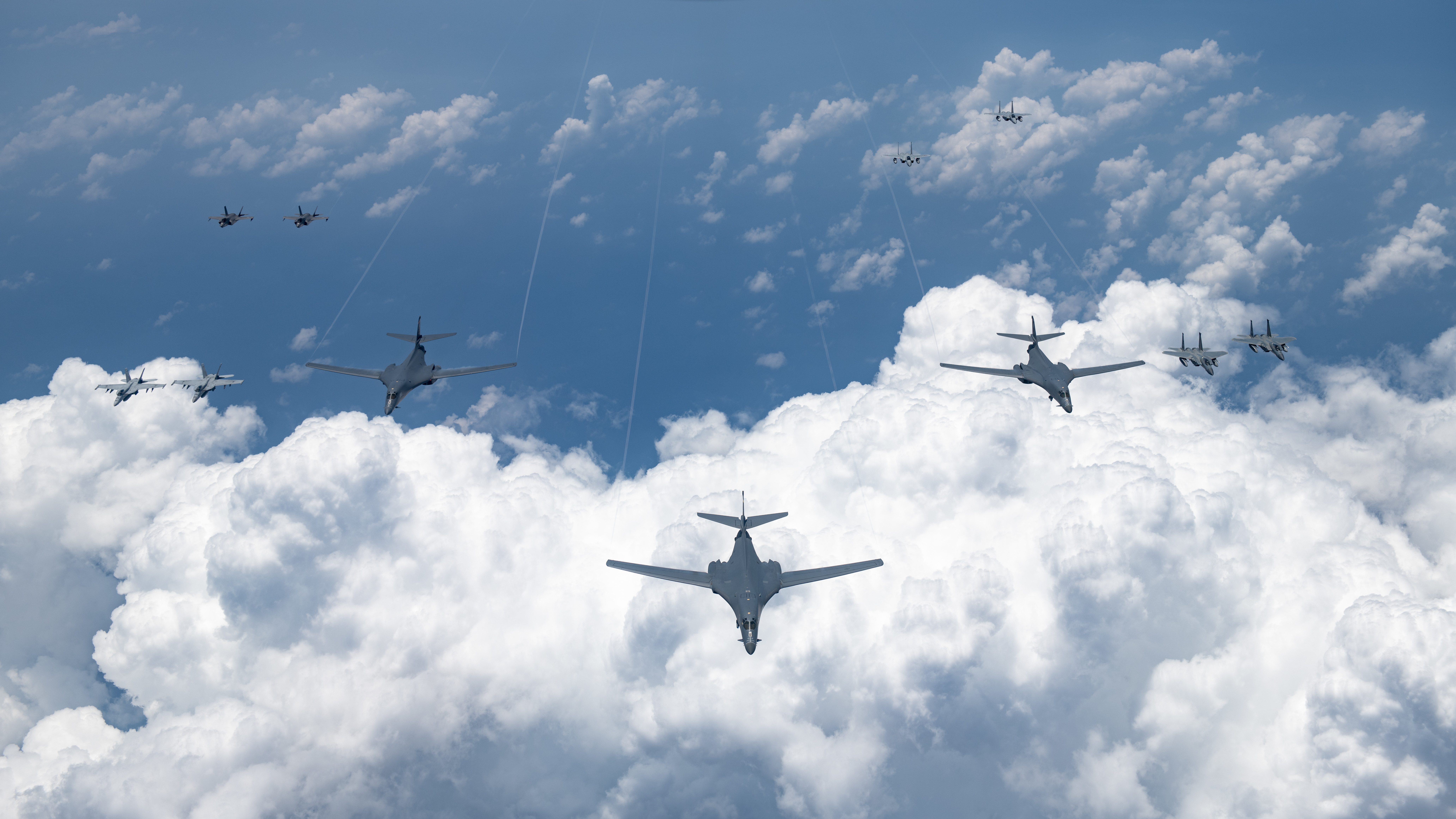 U.S. Air Force, Navy, Marine Corps and Air Self-Defense Force aircraft conduct a large-scale joint and bilateral integration training exercise on Tuesday in airspace near Japan. | U.S. AIR FORCE