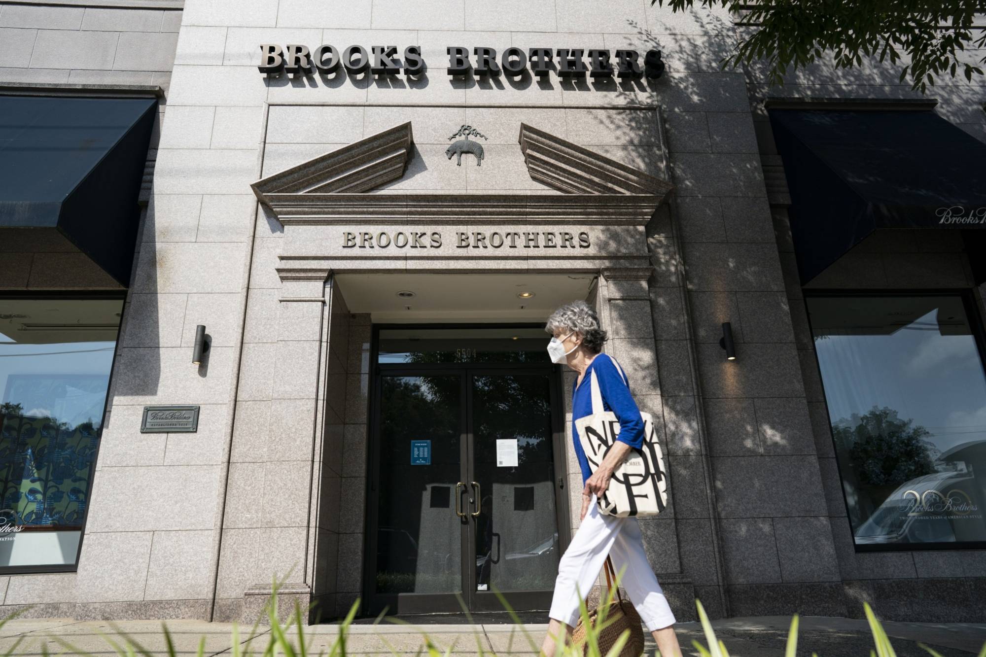 Brooks Brothers Group Inc. filed for bankruptcy in July, felled by the coronavirus pandemic's impact on clothing sales and its own heavy debt load. | BLOOMBERG