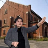 Chieko Kiriake says the former Army Clothing Depot’s buildings in Hiroshima are testament to how precious peace is through their mere presence. | CHUGOKU SHIMBUN

