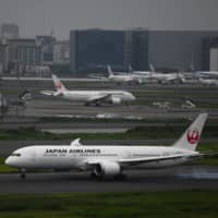 Japan Airlines Co. posted a net loss of ¥93.71 billion in the April-June quarter amid the coronavirus pandemic.  | BLOOMBERG