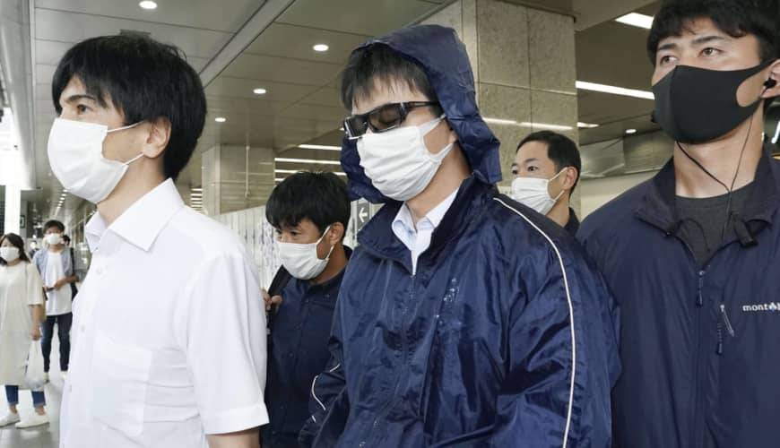 Alleged actions: Naoki Yamamoto arrives in Kyoto after being arrested on suspicion of assisting a death. | KYODO
