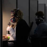 Contact tracers with the Houston Health Department monitor the spread of the coronavirus in July.  | REUTERS