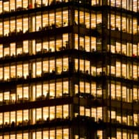 The dry, climate-controlled environments found in virtually all modern office buildings give COVID-19 what it needs to reproduce. | GETTY IMAGES