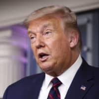 U.S. President Donald Trump speaks during a briefing with reporters in Washington on Tuesday.  | AP