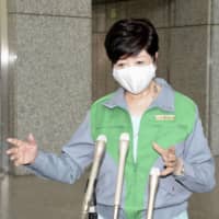 Tokyo Gov. Yuriko Koike speaks to reporters Tuesday. | KYODO