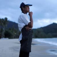 A chef stands on an empty beach waiting for customers on Koh Chang island in Thailand last month. | REUTERS