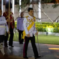 Thailand\'s King Maha Vajiralongkorn arrives to pay his respects at the King Rama I monument in Bangkok on April 6 to honor the start of the Chakri dynasty\'s reign. | REUTERS