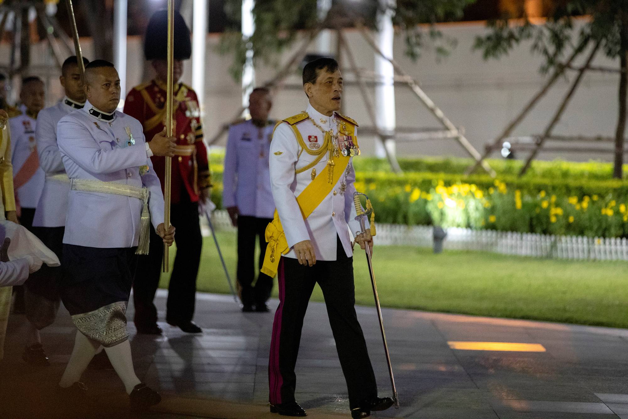 Thailand's King Maha Vajiralongkorn arrives to pay his respects at the King Rama I monument in Bangkok on April 6 to honor the start of the Chakri dynasty's reign. | REUTERS