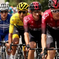 Team INEOS rider Egan Bernal of Colombia, wearing the overall leader\'s yellow jersey, races in the peloton during Stage 20 of the 2019 Tour de France on July 27, 2019, between Albertville and Val Thorens, France. | REUTERS