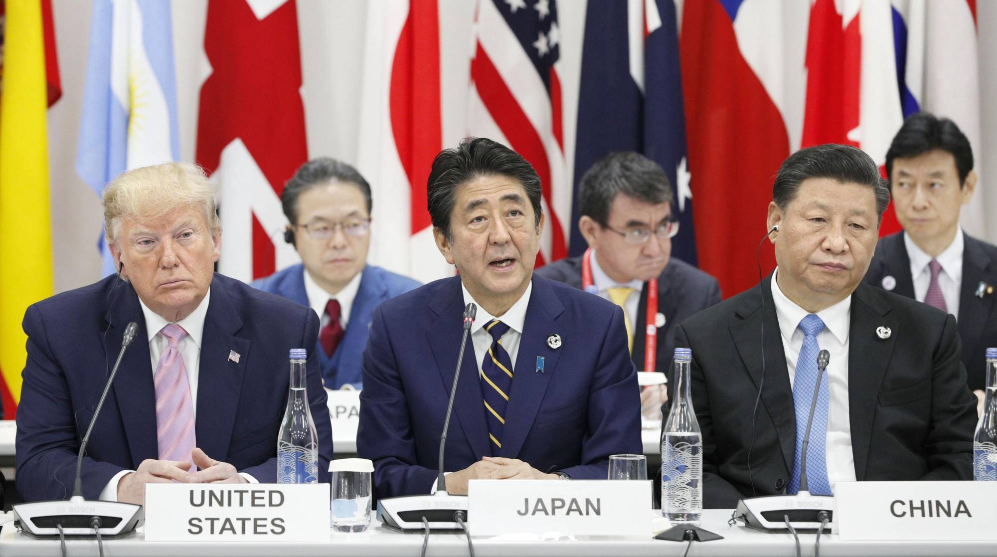 The 'new Cold War' developing between the United States under President Donald Trump and China under President Xi Jinping is presenting problems for Prime Minister Shinzo Abe regarding alliances and security. | KYODO