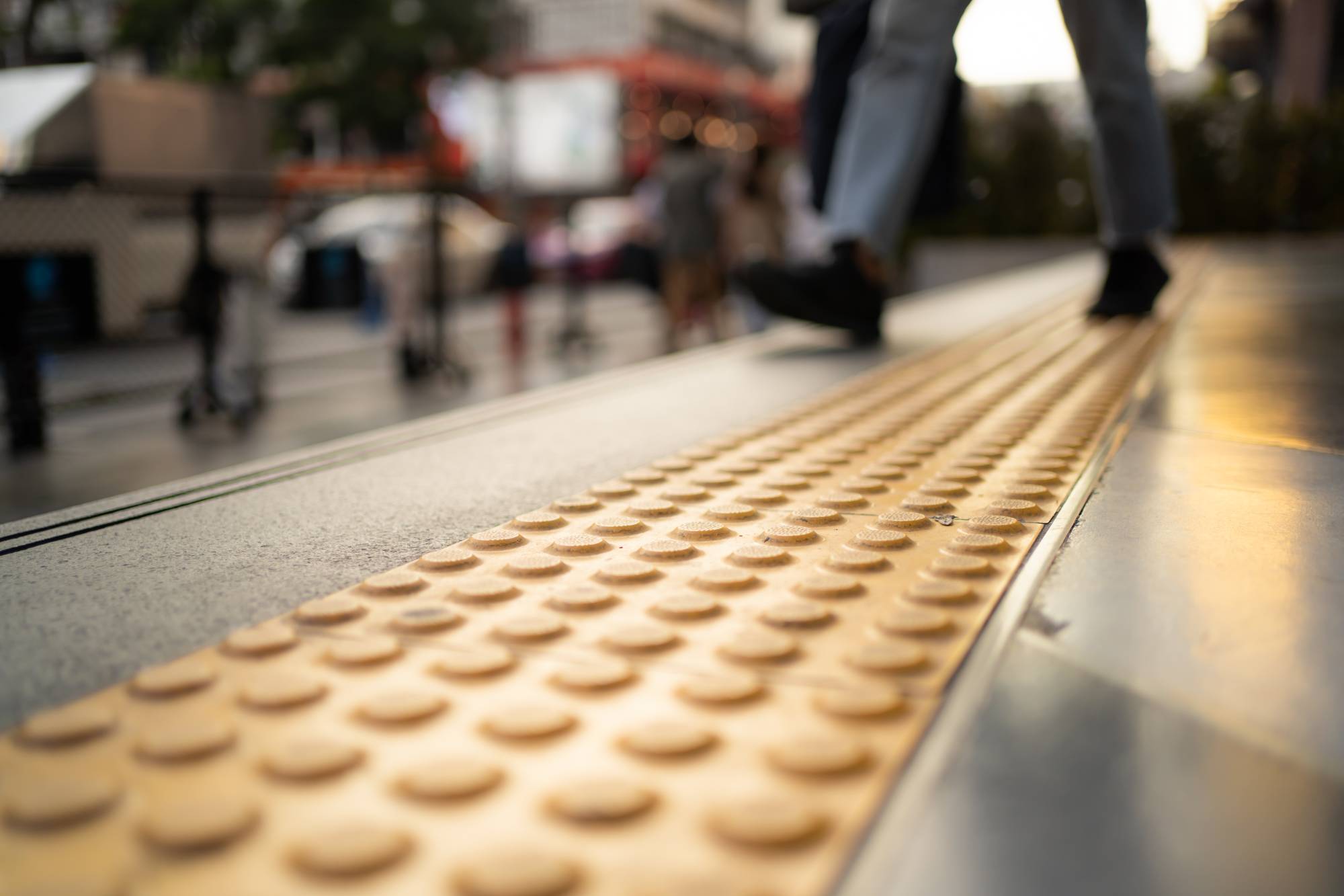 Tactile paving allows people with visual impairments to navigate Japan's congested footpaths and train stations. | GETTY IMAGES