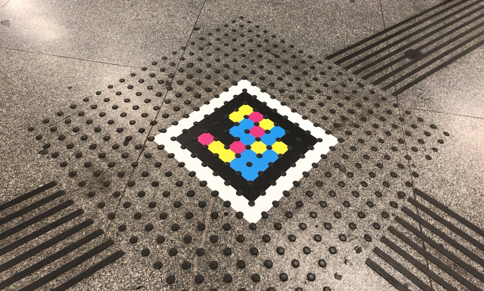 New technology produced by Madrid-based enterprise NaviLens uses a colorful marker based on a QR code to provide audible information to visually impaired people without the use of GPS or Bluetooth. | COURTESY OF NAVILENS 