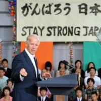 U.S. Vice President Joe Biden delivers a speech in front of people affected by the March 11 earthquake and tsunami, at Sendai Airport on Aug. 23, 2011. | KYODO
