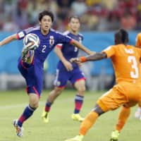 Atsuto Uchida plays against Cote d\'Ivoire in the World Cup in Recife, Brazil, in June 2014. | KYODO